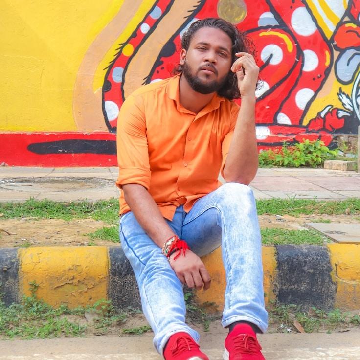 Kaveri Mehta, Lead Design Curator at Smart Decision Partners, reviewing corporate floral arrangements